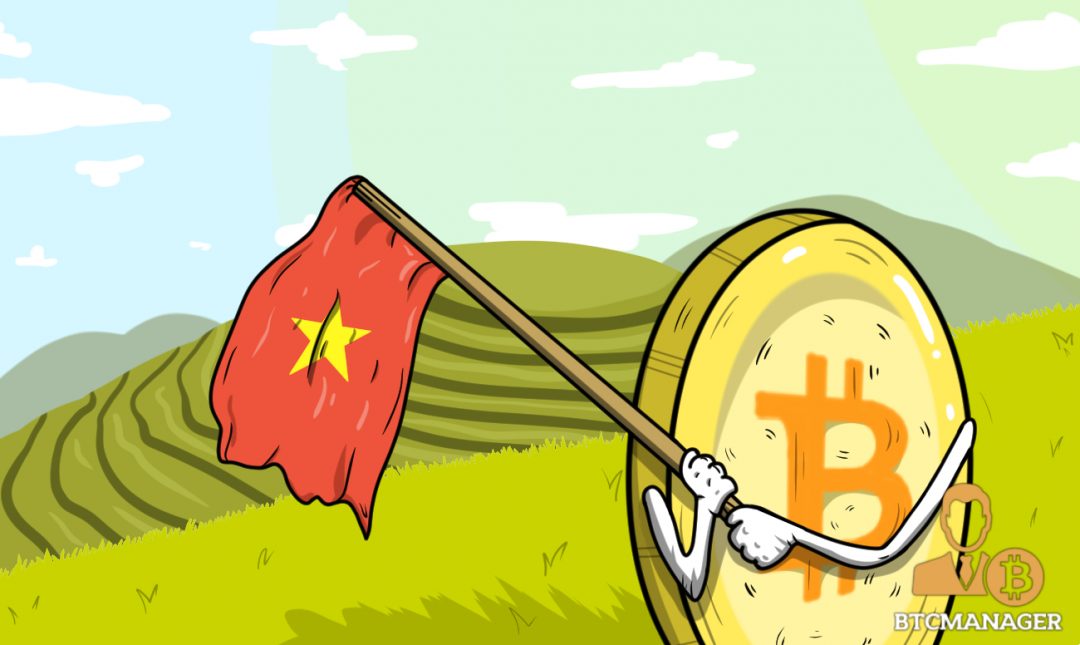 A bitcoin man holding a Vietnamese flag walking through a grass field.