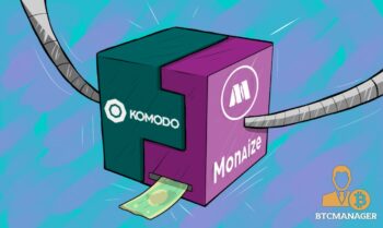 a cube made up of two parts joins togethre, representing the partnership between Komodo and Monaize