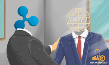 Ripple executive shakes hands with Swift person