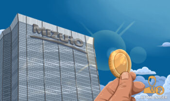 man holds up a coin against Mizuho building