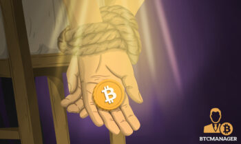 Tied Hands Holding Bitcoin