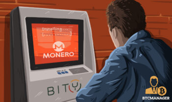 Man Standing in front of a Bity ATM Monero Logo on Screen