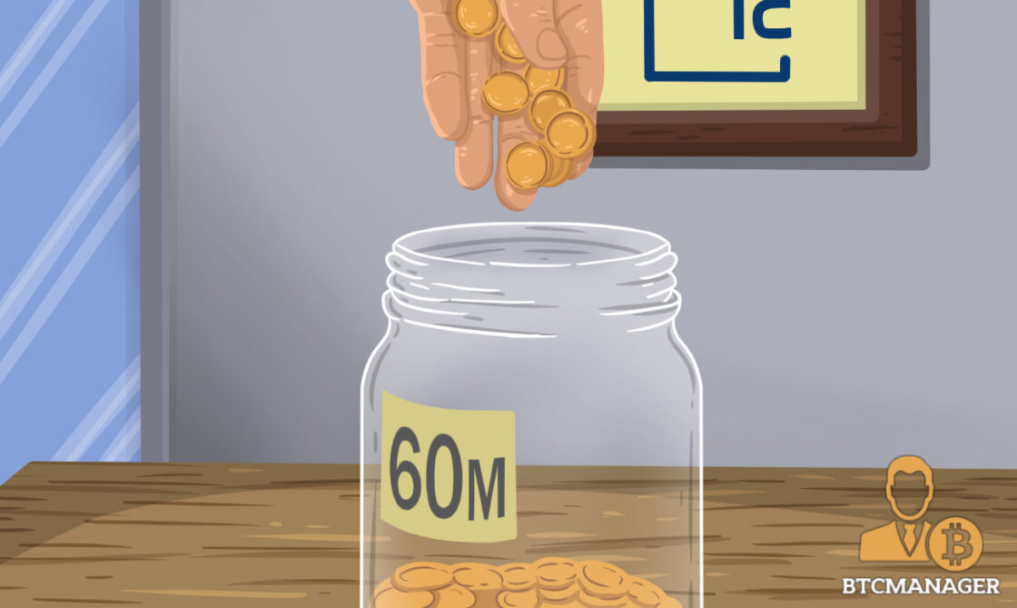Hand Dropping Coins into a Coin Jar