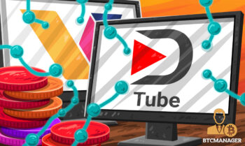 DTube and Vevue Computer Screens Next to Coins