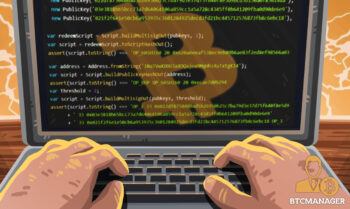 Two Hands Typing on a Laptop with Bitcoin Code