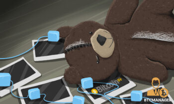 Teddy Bear Laying on iPads with Bitcoin SV Logo