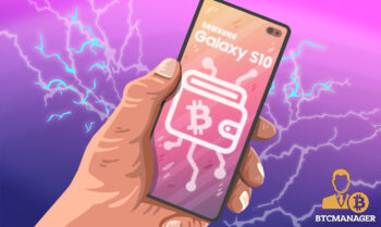 Hand Holding a Smartphone with Bitcoin Wallet