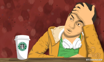 Man with Headphones next to a Starbucks Coffee