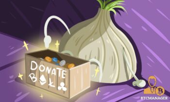 Onion Sitting next to Box of Cryptocurrencies