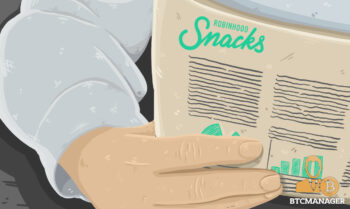 Hands Holding a RobinHood Snacks Newsletter