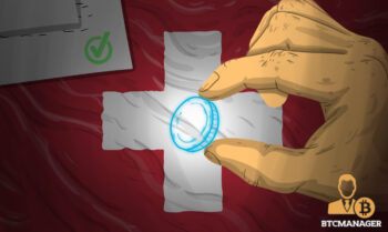 Hand Holding a Holographic Coin with Swiss Flag in the Background