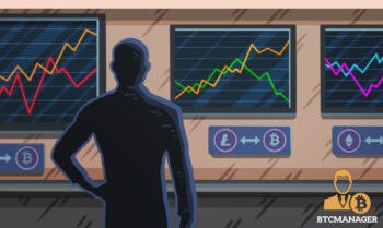 Person Staring at a Series of Crypto Charts