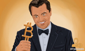 Celebrity Holding a Bitcoin Award
