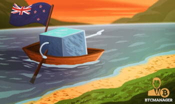 A blue block in a boat with a new zealand flag