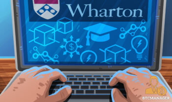 Typing on a laptop with Wharton on the screen academic hats and blockchains fintech