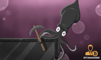 Small Black Squid Sitting on a Computer Screen