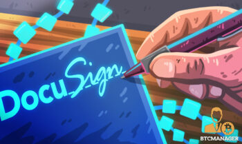 A pen Signing a blockchain enhanced blue DocuSign paper