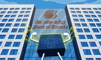 Blockchain standing triumphantly outside of the Bank of Baroda building